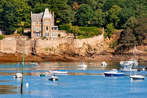 A historic chateau along a river in northern France